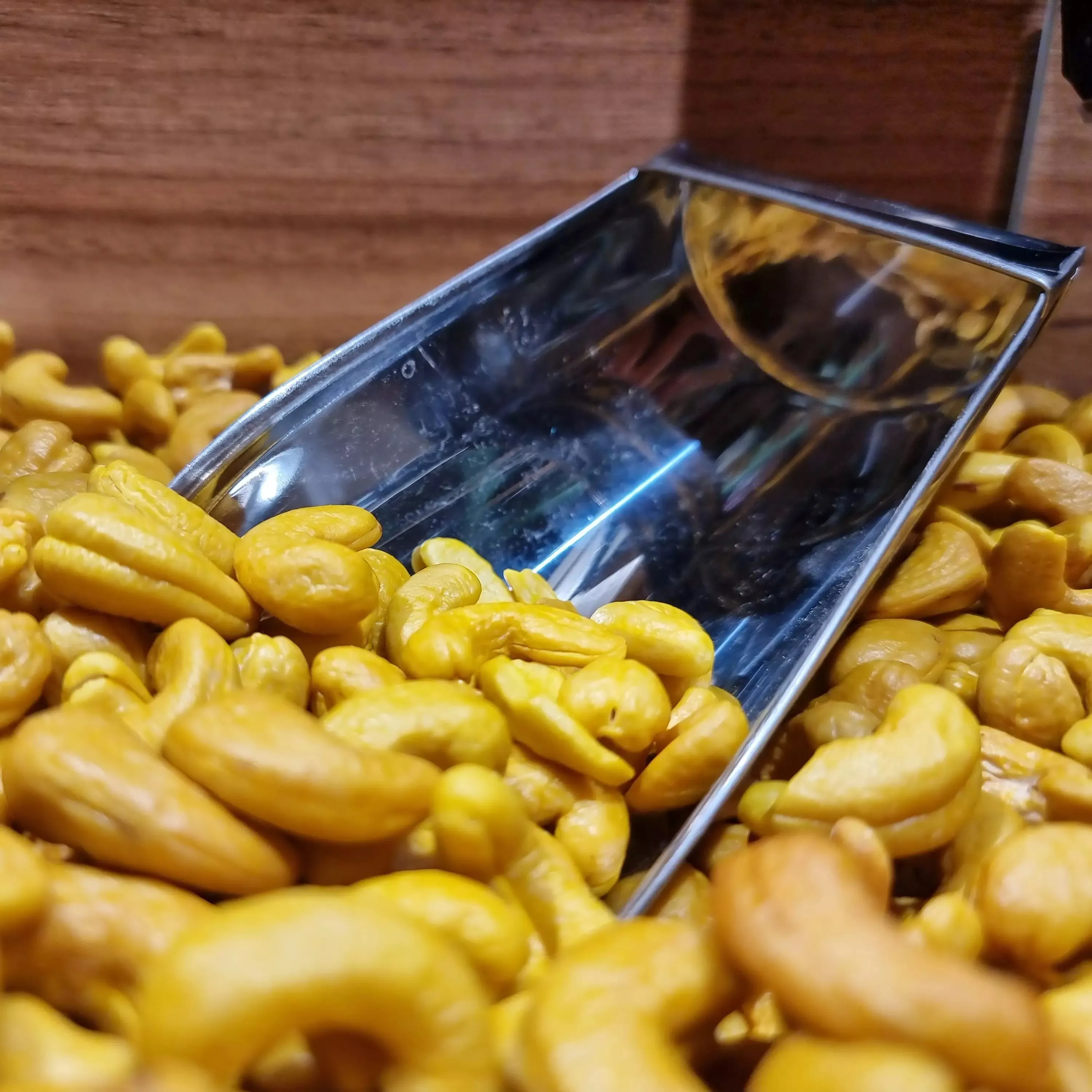 unshelled cashew purchase price + sales in trade and export